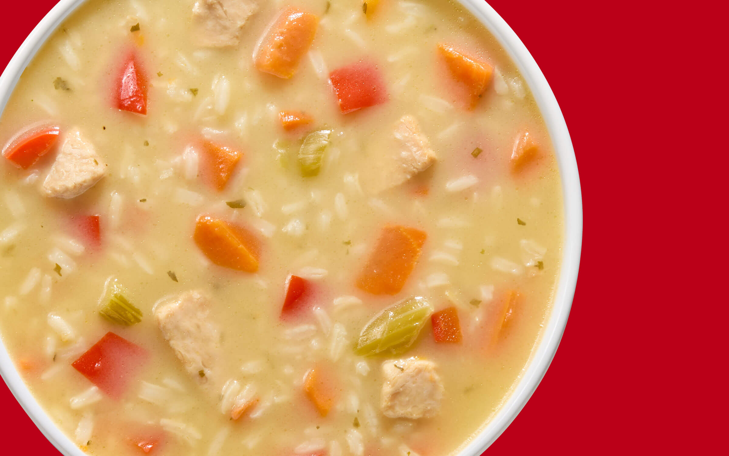 Soupe poulet et riz à la noix de coco et au poivron rouge