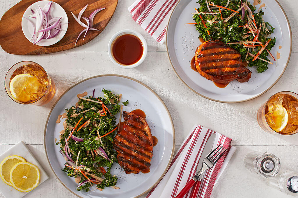 BBQ Pork Chops with Kale and Apple Slaw